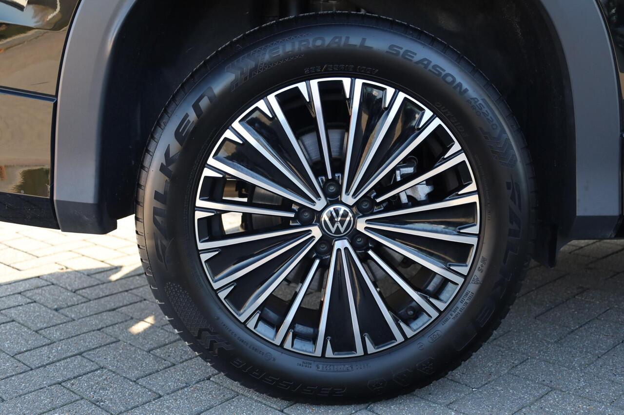 Volkswagen Tayron 1.5 eHybrid Elegance wegklapbare trekhaak leder / alcantara area view elektrische achterklep spiegel pakket navigatie IQ Matrix comfort telefoon laders 2 x travel assist ACC keys less acces & entry 18" LMV napoli privacy glas chroom pakket travel assist d