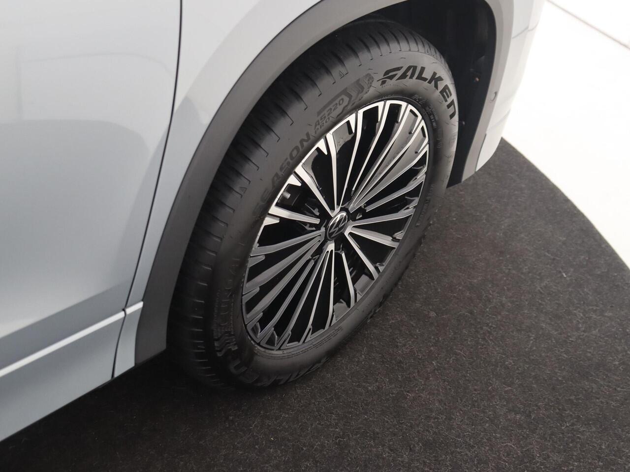 Volkswagen Tayron 1.5 eHybrid Life Edition | SoH 100% | Trekhaak | Achteruitrijcamera | Adaptieve demping systeem | 3-zone airco | Dodehoek detectie | Adaptieve cruise control | CarPlay | Stoel- en stuurwielverwarming |