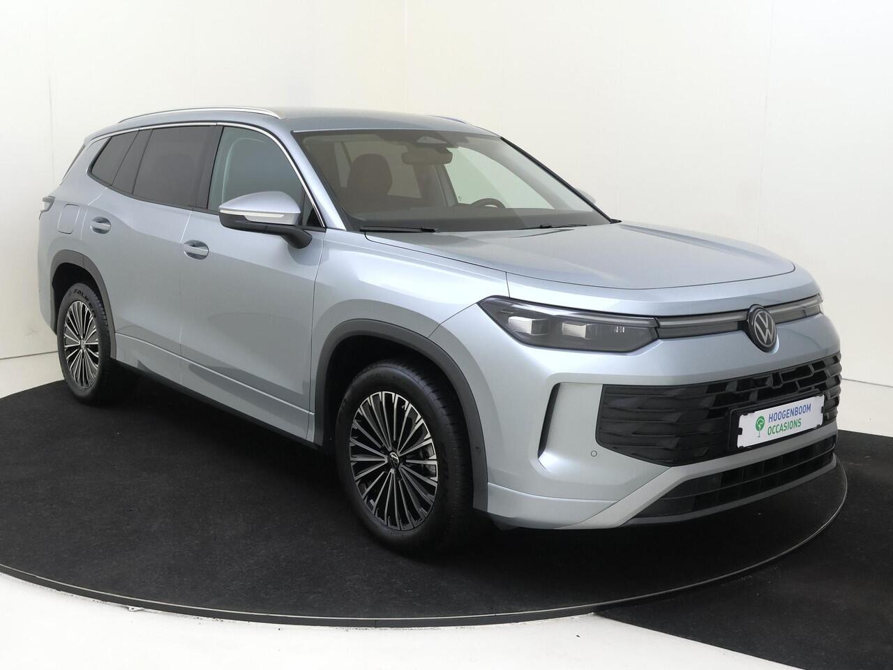 Volkswagen Tayron 1.5 eHybrid Life Edition | SoH 100% | Trekhaak | Achteruitrijcamera | Adaptieve demping systeem | 3-zone airco | Dodehoek detectie | Adaptieve cruise control | CarPlay | Stoel- en stuurwielverwarming |