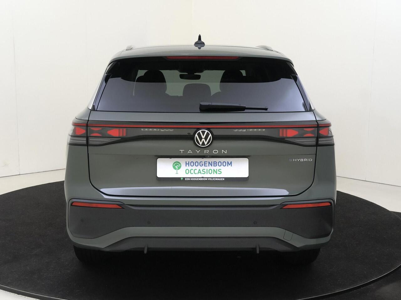 Volkswagen Tayron 1.5 eHybrid Life Edition | SoH 96% | Trekhaak | Dodehoek detectie | Stoelverwarming voor en achter | Achteruitrijcamera | Adaptieve demping | Parkeerassistent | Adaptieve cruise control |