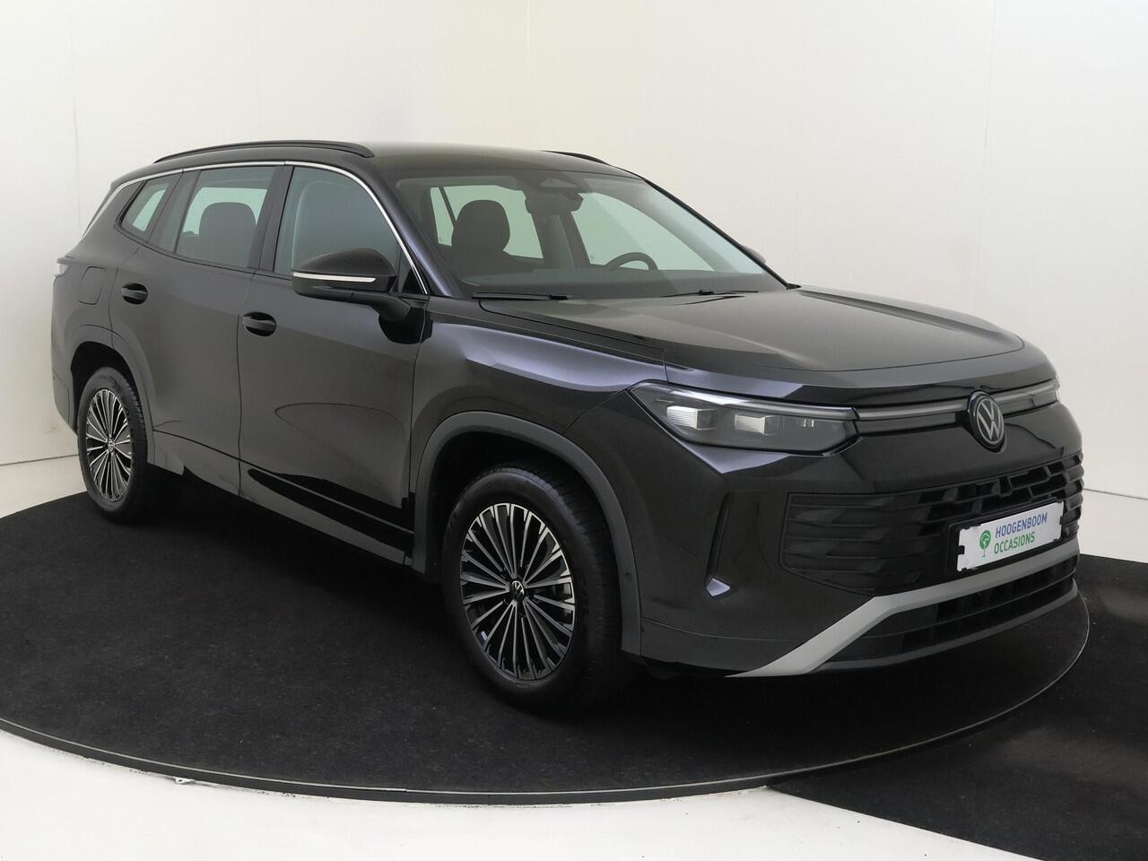 Volkswagen Tayron 1.5 eHybrid Life Edition | SoH 100% | Trekhaak | Parkeerassistent | Adaptieve demping | Stoel- en stuurwielverwarming | Dodehoek detectie | Achteruitrijcamera | Adaptieve cruise control | Navigatie |