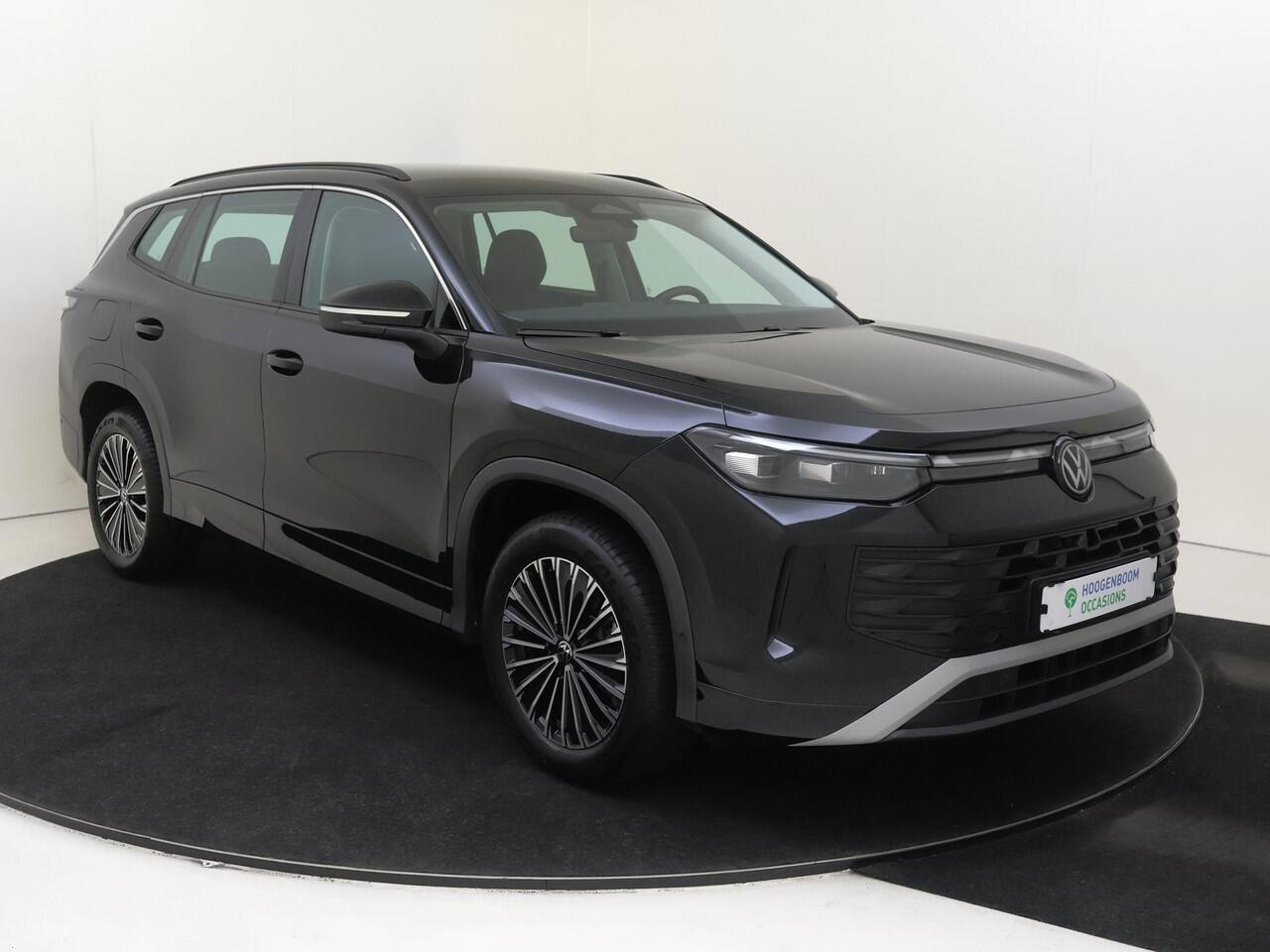 Volkswagen Tayron 1.5 eHybrid Life Edition | SoH 100% | Trekhaak | Achteruitrijcamera | Adaptieve demping systeem | Adaptieve cruise control | Dodehoek detectie | Parkeerassistent | Stoel- en stuurwielverwarming |