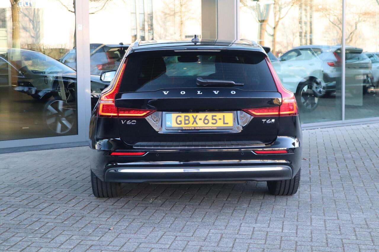 Volvo V60 2.0 T6 Plug-in hybrid AWD Essential Edition | Adaptive Cruise Control met Pilot Assist| Dodehoekdetectie| Stoelverwarming voor + achter| Stuurwielverwarming| Extra getint glas achter| RVS-geborstelde bumperbescherming|