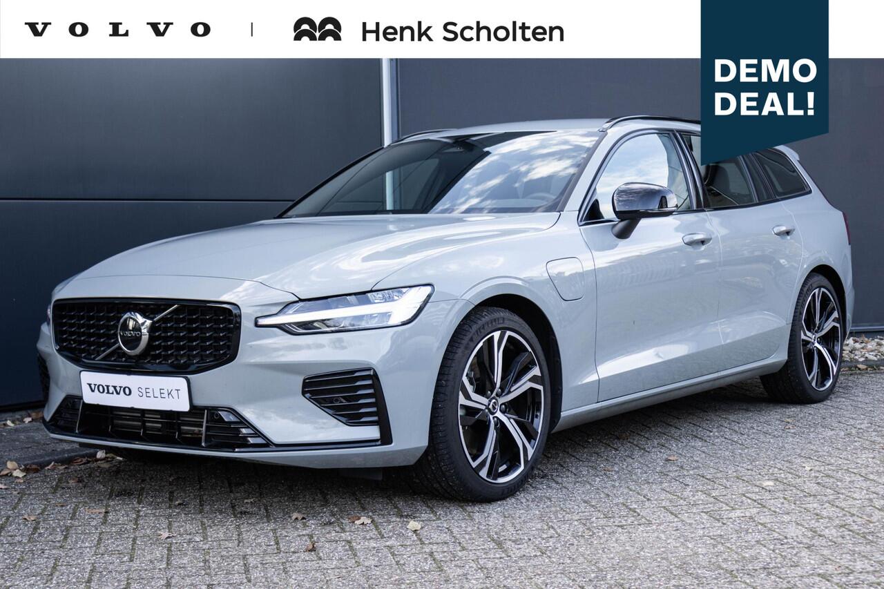 Volvo V60 T6 Plug-in hybrid AWD Plus Dark | Verwarmbare voorstoelen | Verwarmbaar stuurwiel | Verwarmbare achterbank | Charcoal Sportleder | Zwarte hemel | 19 inch Lichtmetalen velgen | Parkeercamera | Elektrische verstelbare voorstoelen met geheugen | Premium audi