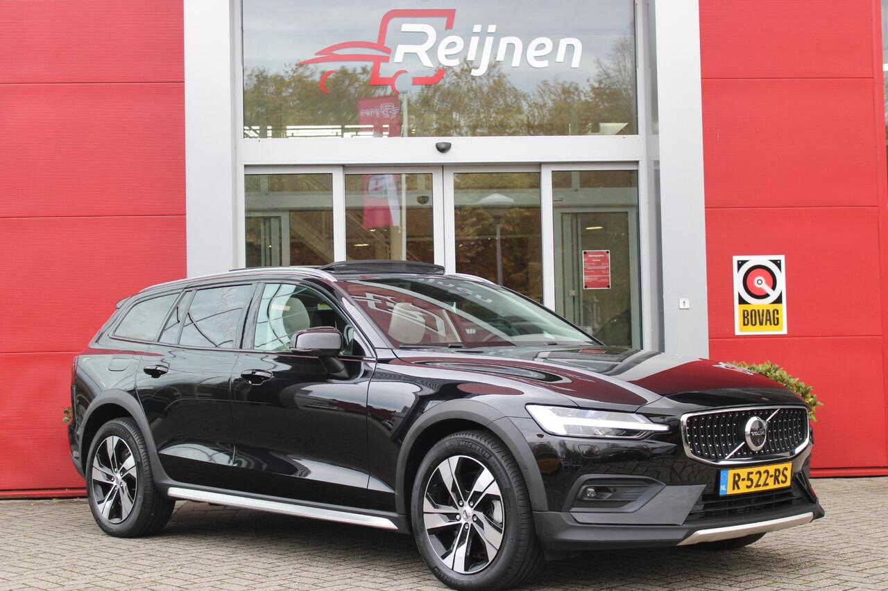 Volvo V60 CROSS COUNTRY 2.0 B5 250PK CROSSCOUNTRY AWD Ultimate AWD (VIERWIELAANDRIJVING) | PANORAMISCH SCHUIF/KANTELDAK | PARKEERVERWARMING MET TIMER (STANDKACHEL) | MORITZ LEDEREN BEKLEDING MET COMFORTSTOELEN EN DUAL TONE LEDEREN STUURWIEL | ELEKTRISCH VERSTELBARE VOORSTOELEN M