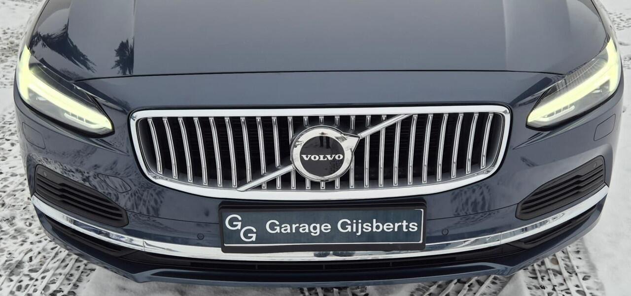 Volvo V90 2.0 T6 Phev AWD Plus 19" Wielen - Panoramadak - Trekhaak - Harman Kardon Audio - Camera achter - Climate - Privacy Glass - Zwart lederen Interieur - Electrisch bedienbare voorstoelen met memory- Achterbank verwarming - Voorruit verwarming