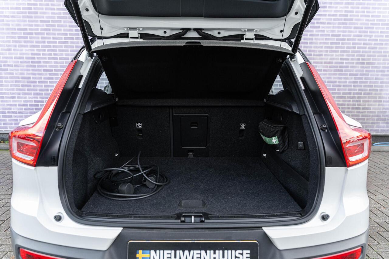 Volvo XC40 1.5 T4 Recharge R-Design Expression | Harman Kardon Audio | Stoel - / Stuurvewarming | Adaptive Cruise Control | Parkeerverwarming | Dodehoekdetectie | Parkeer Camera | Parkeer sensoren Voor + Achter | Volvo On Call |