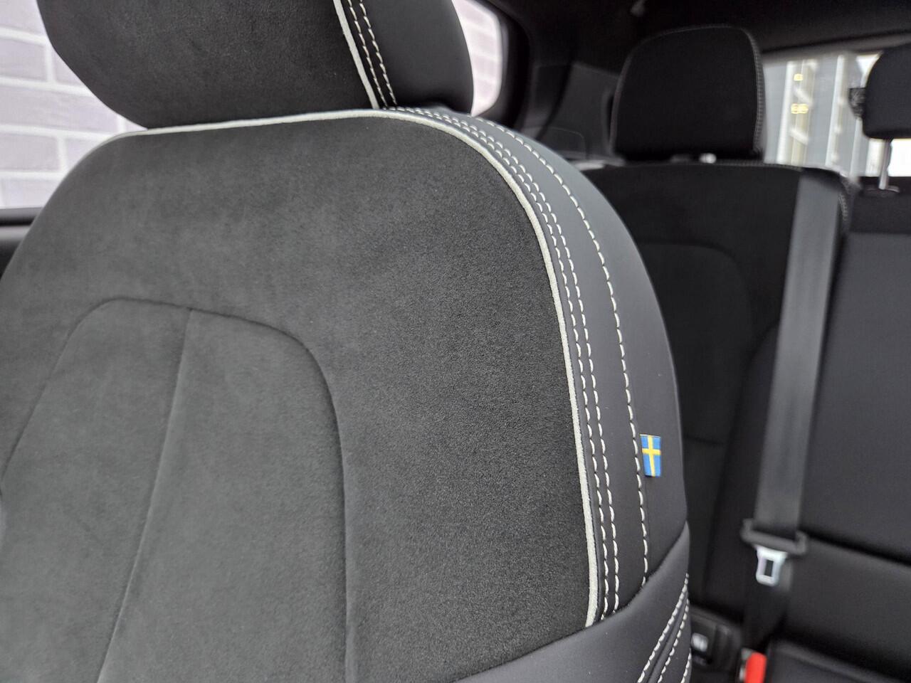 Volvo XC40 Plug-in hybrid T4 Ultimate Dark | Trekhaak | Panoramadak | 360° camera | Harman Kardon audio | Adaptive cruise control | Navigatie | Stoel- en stuurverwarming | Apple Carplay / Android Auto | Elektrische stoelverstelling |