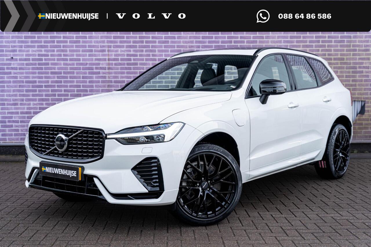 Volvo XC60 2.0 T6 Plug-in hybrid AWD R-Design | Google | Long Rang | Elektrische Stoelverstelling | Adaptieve Cruise Control | Stoel-/Stuurverwarming | Massagestoelen | Schuif-/Kanteldak | Parkeercamera | Head-Up Display | Parkeerverwarming | Keyless Entry | Lederen