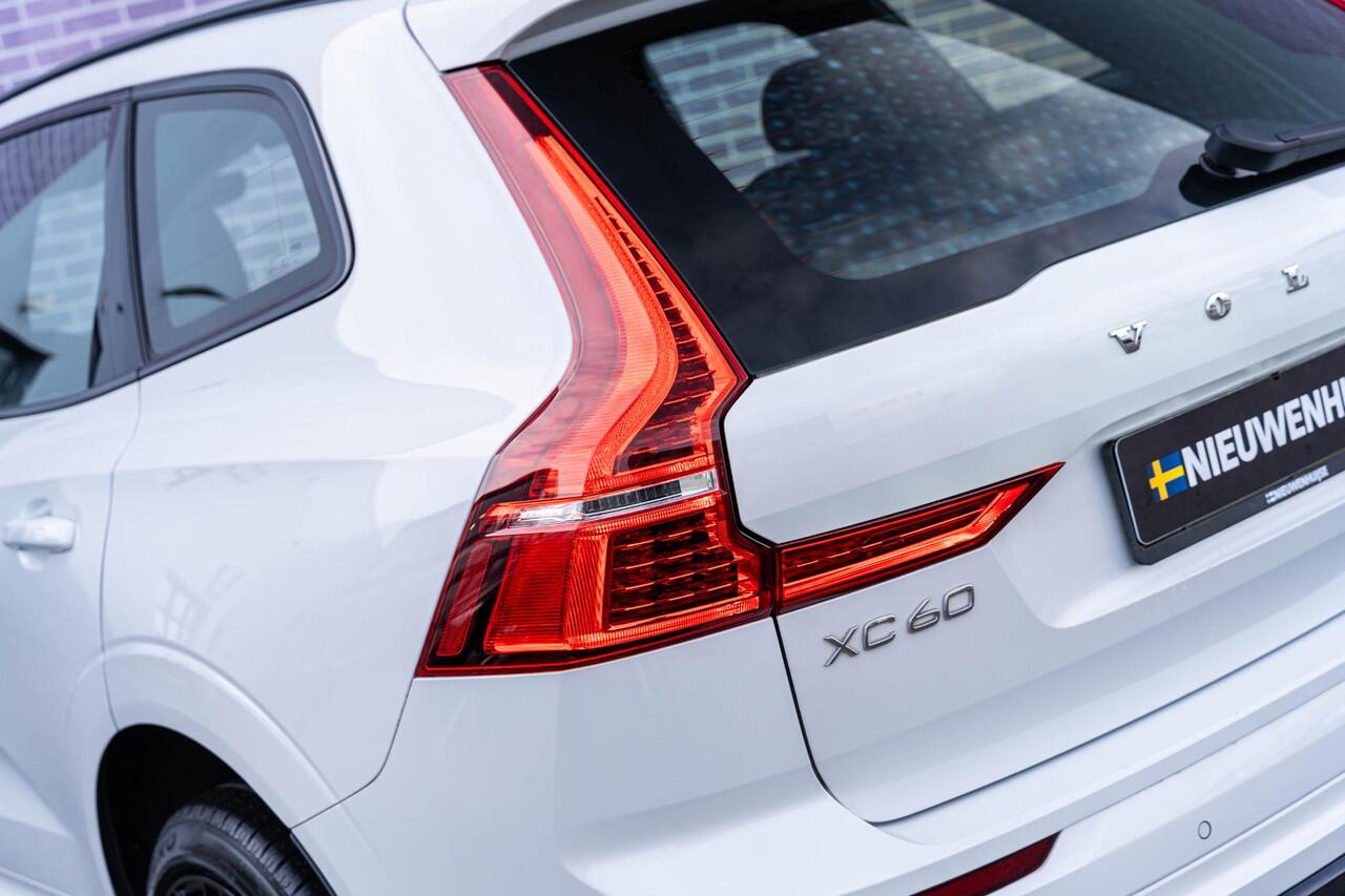 Volvo XC60 2.0 T6 Plug-in hybrid AWD R-Design | Google | Long Rang | Elektrische Stoelverstelling | Adaptieve Cruise Control | Stoel-/Stuurverwarming | Massagestoelen | Schuif-/Kanteldak | Parkeercamera | Head-Up Display | Parkeerverwarming | Keyless Entry | Lederen