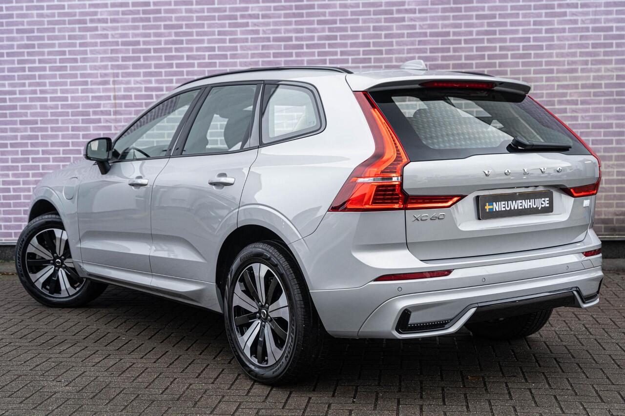 Volvo XC60 2.0 T6 Plug-in hybrid AWD Plus Dark | Google | Long Range | Schuif-/Kanteldak | Camera | Trekhaak | Adaptieve Cruise Control | Lederen Bekleding | Elek. Stoelen | Stoelverwarming Voor + Achter | Zitverlenging | Stuurverwarming | Memory | 19" LM