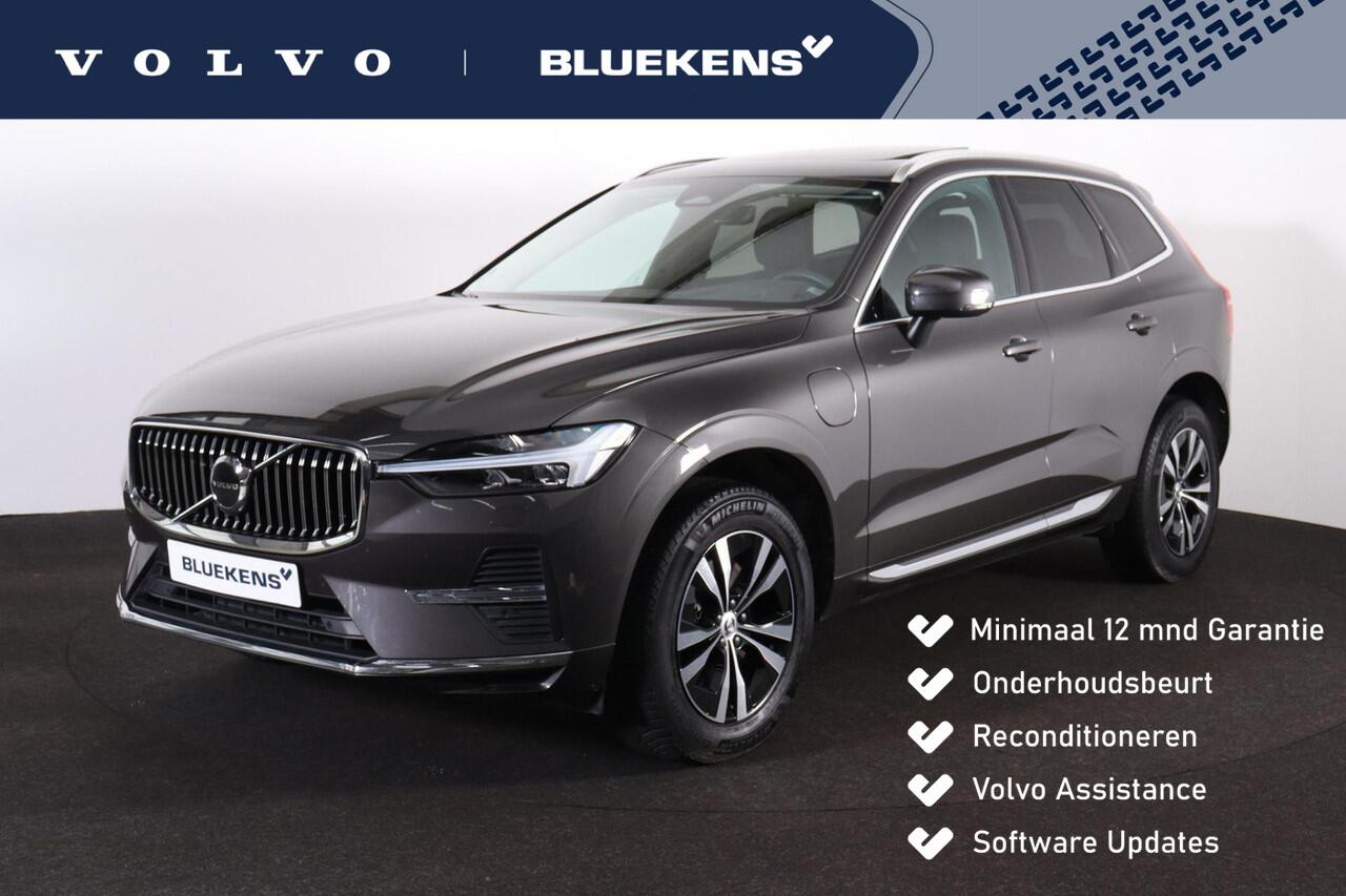 Volvo XC60 T6 Recharge AWD Core Bright - Panorama/schuifdak - IntelliSafe Assist - Adaptieve LED koplampen - Parkeercamera achter - Verwarmde voorstoelen, stuur & achterbank - Parkeersensoren voor & achter - Draadloze tel. lader - Standkachel - Extra getint glas - E