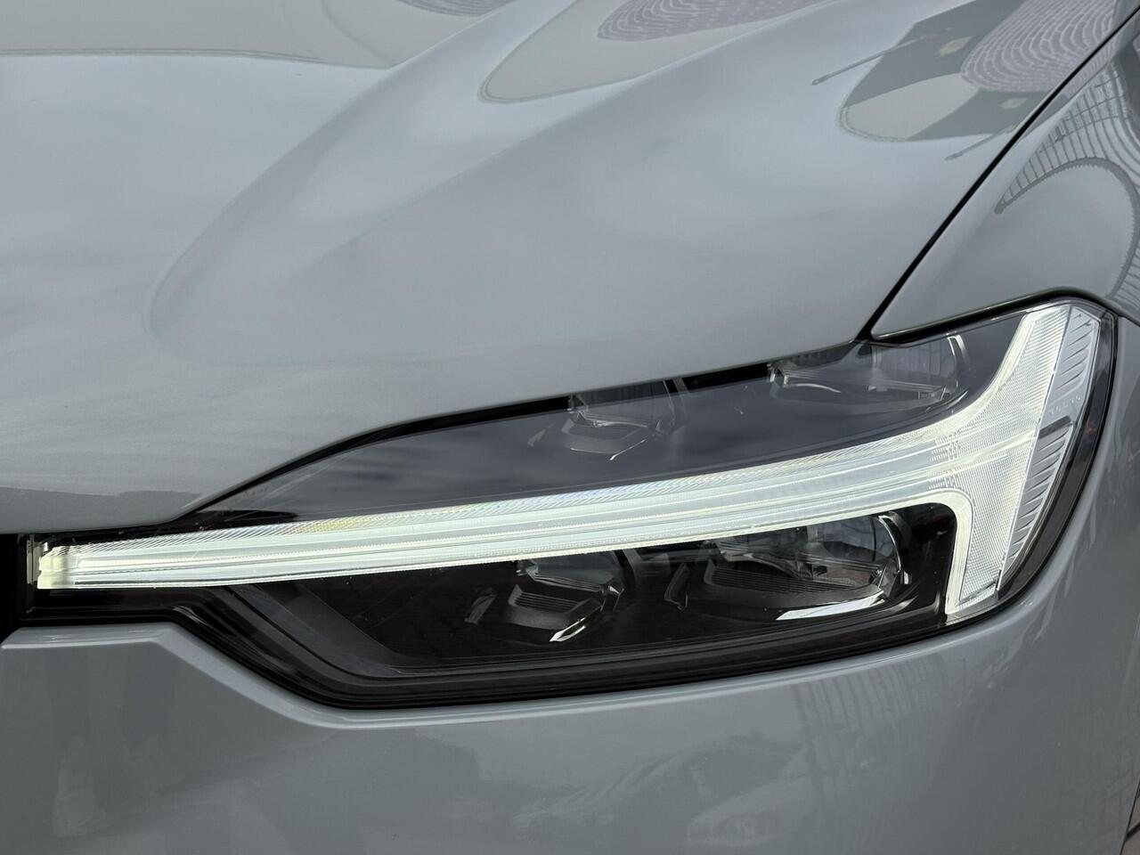 Volvo XC60 2.0 T6 Plug-in hybrid AWD Plus Dark | Adaptieve cruise control | 360° camera | Trekhaak | Stoel- en stuurverwarming | Dode hoek detectie BLIS | Panorama dak | All season banden | Google Auto |