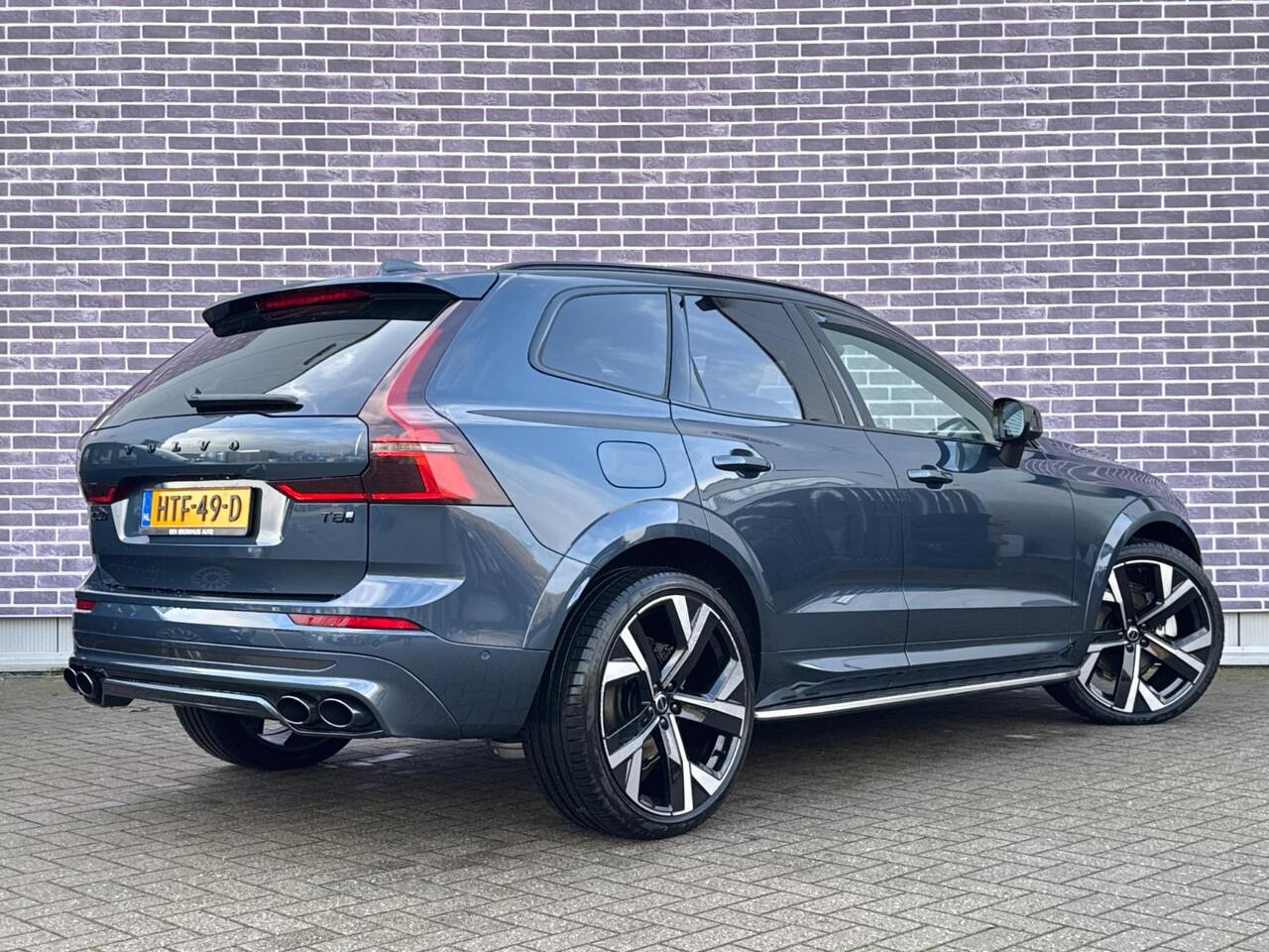 Volvo XC60 2.0 T8 Plug-in hybrid AWD Ultra Black Edition | Facelift | Luchtvering | Heico Body Kit | Bowers & Wilkins | Head Up Display | Stoelventilatie/massage-functie | Schuif Kantel Dak | 360 Camera | Head Up Display | Donker Glas | 22" | Trekhaak |